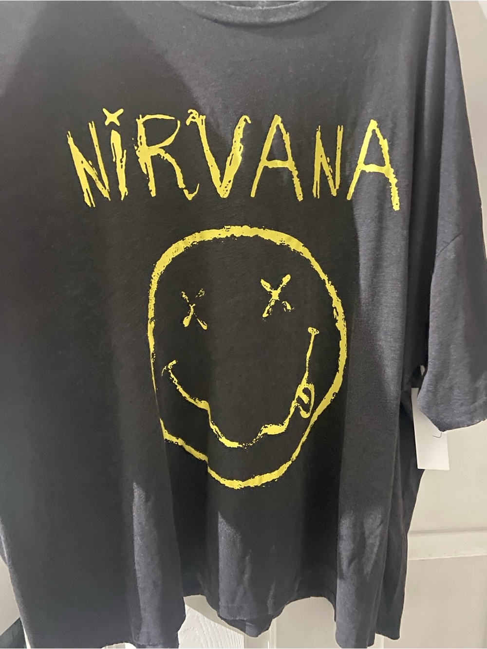NIRVANA Black Tee with yellow Smiley Logo